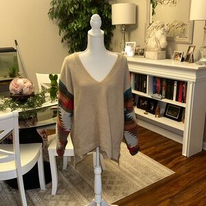 Cozy Beige V-Neck Sweater with Multicolor Sleeves